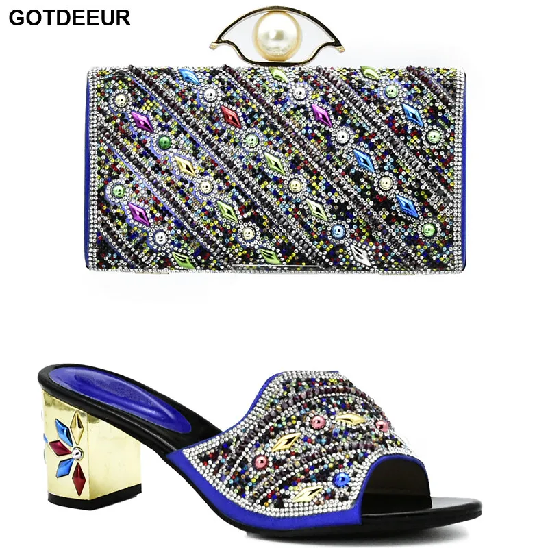 Комплект из туфель и сумочки в африканском стиле красного цвета итальянский