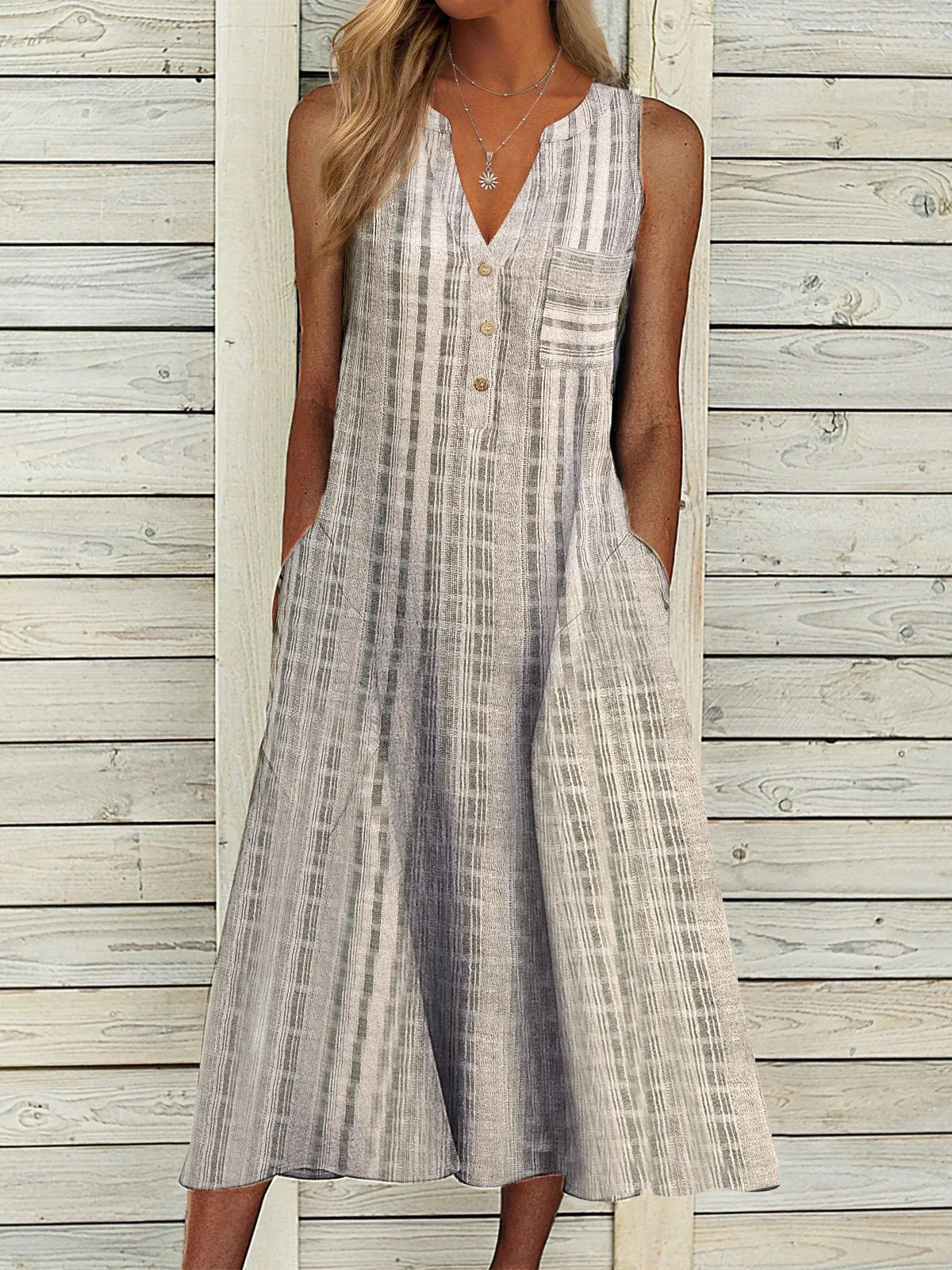 

2021 summer new women's V-neck sleeveless dress loose mid-length dress