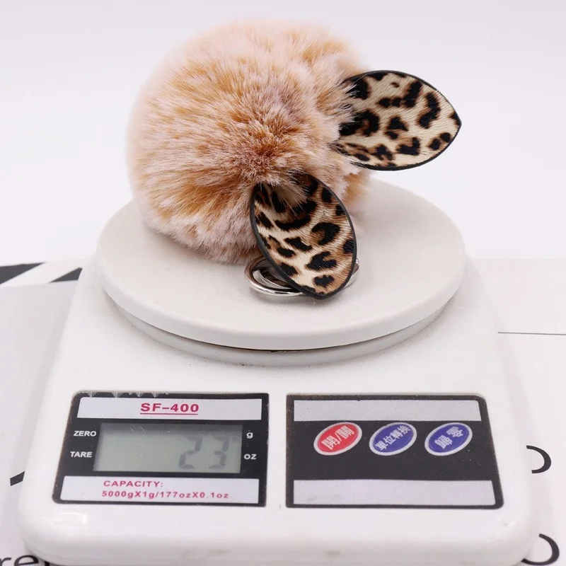 2021 Autumn and Winter Hot Leopard Print Ear Hair Ball Keychain Ladies Bag Pendant Plush Car Ornament for Women Girl