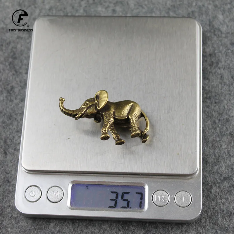 

Фигурки слонов из меди