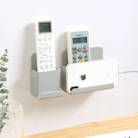 wall mounted remote control storage box adhesive wall mobile phone charging bracket small items storage rack