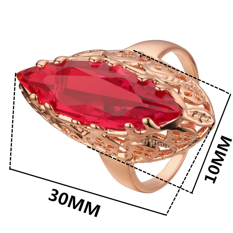 Женское кольцо из розового золота 2020 пробы с фианитом и овальным красным камнем |