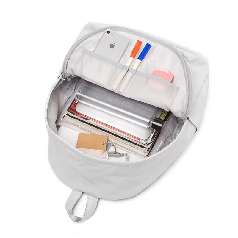 

Backpack women's solid color versatile schoolbag Korean style high capacity fashionable backpack men's Waterproof