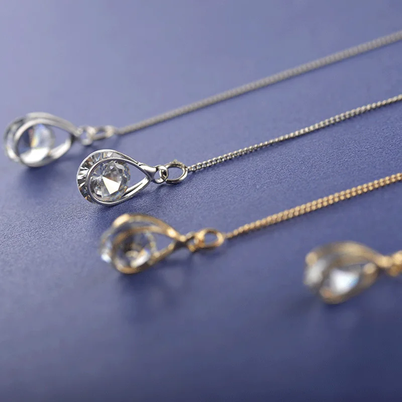 Модные серьги золотистого и серебряного цвета с цепочкой циркониевые