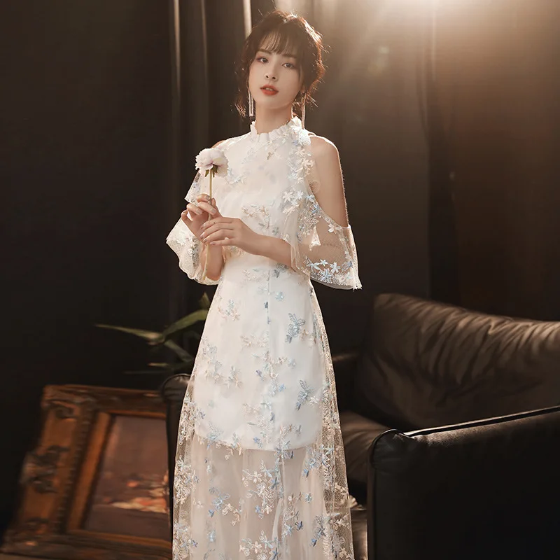 

Высококачественное цветочное кружевное вышитое китайское банкетное платье для выпускного вечера из белого тюля новые темпераментные сказ...