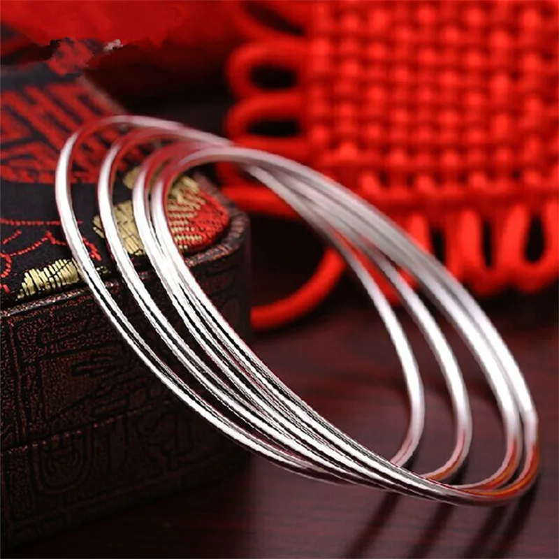 Простой браслет женский тонкий круглые в полоску можно комбинировать