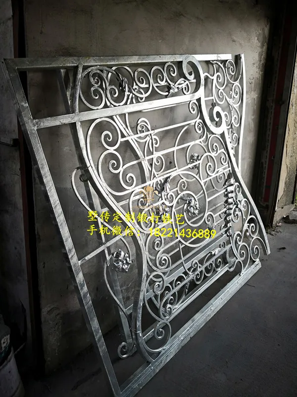 

Hench 100% handmade forged custom designs wrought iron gate