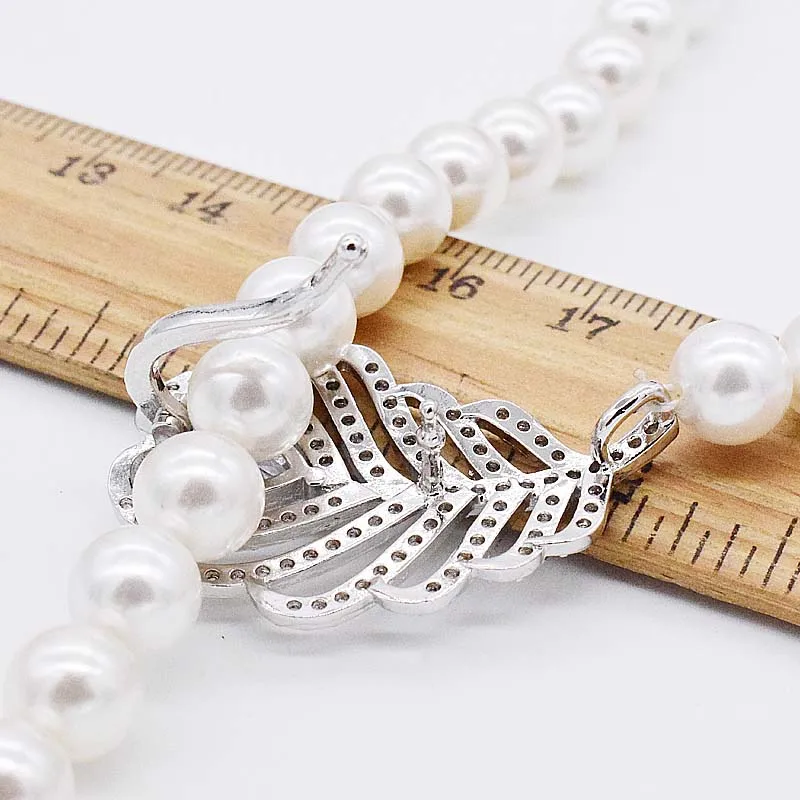 

Hand knotted 8mm white shell pearl micro inlay zircon feather accessories necklace sweater chain 90-95cm