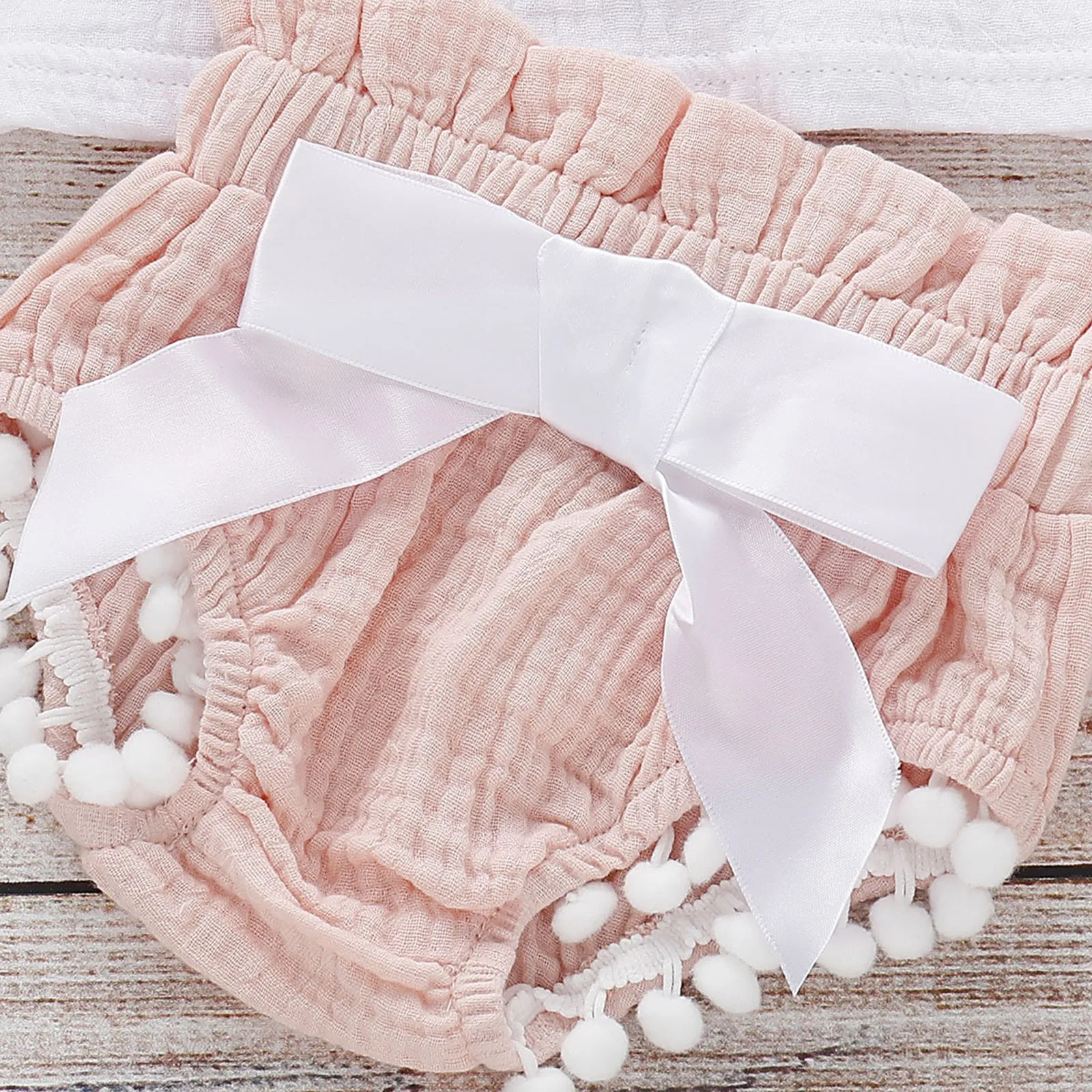 

Baby Girl Sleeveless Cotton And Linen Fringed Ball Top + Bow Shorts + Headband Soft, Comfortable And Breathable Baby Clothing