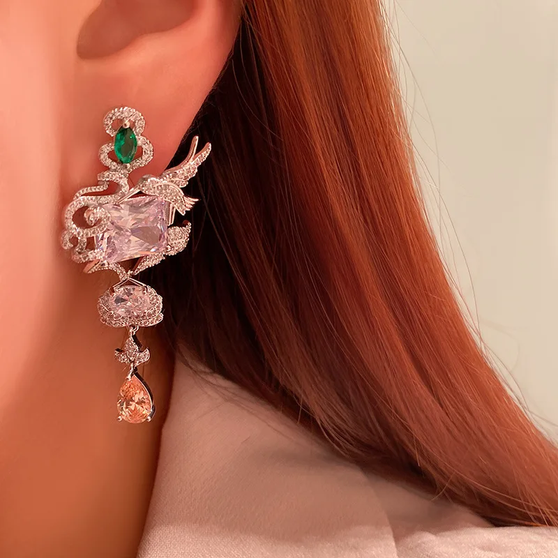 

Luxury dragonfly bird micro-inlaid square drill zircon Xiangyun stereo lotus earrings 925 silver needle flower temperament Daisy