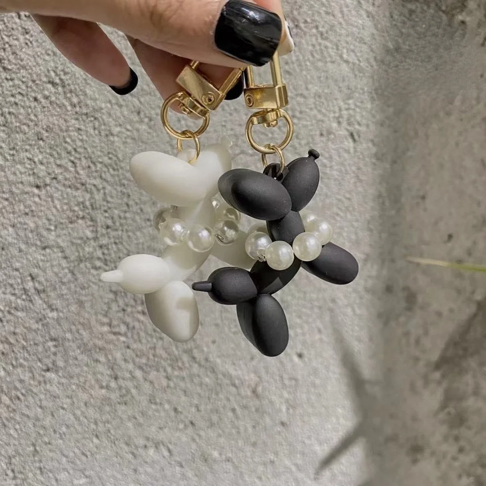 

2021 New Balloon Dog Keychain Female Cute Net Red Earphone Buckle Couple Keychain Pendant Jewelry Pendant Personalized Gift