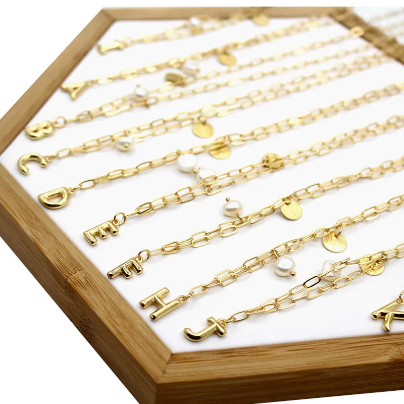 Цепочка с буквами из натурального пресноводного барочного жемчуга 26