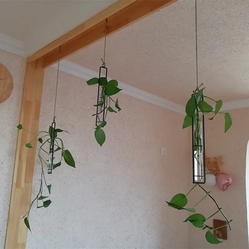 Минималистичная ваза из кованого железа и стекла подвеска пеньковой веревки для