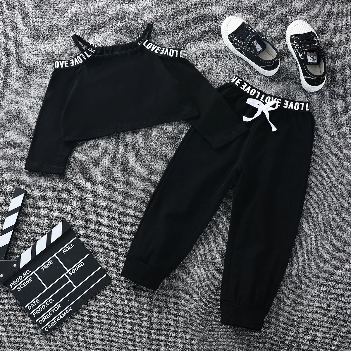 

Spring and Autumn Long Sleeve Leaky Shoulder Short Top Trousers Two-piece Letter Top Lace-up Trousers Two-piece Girl Set