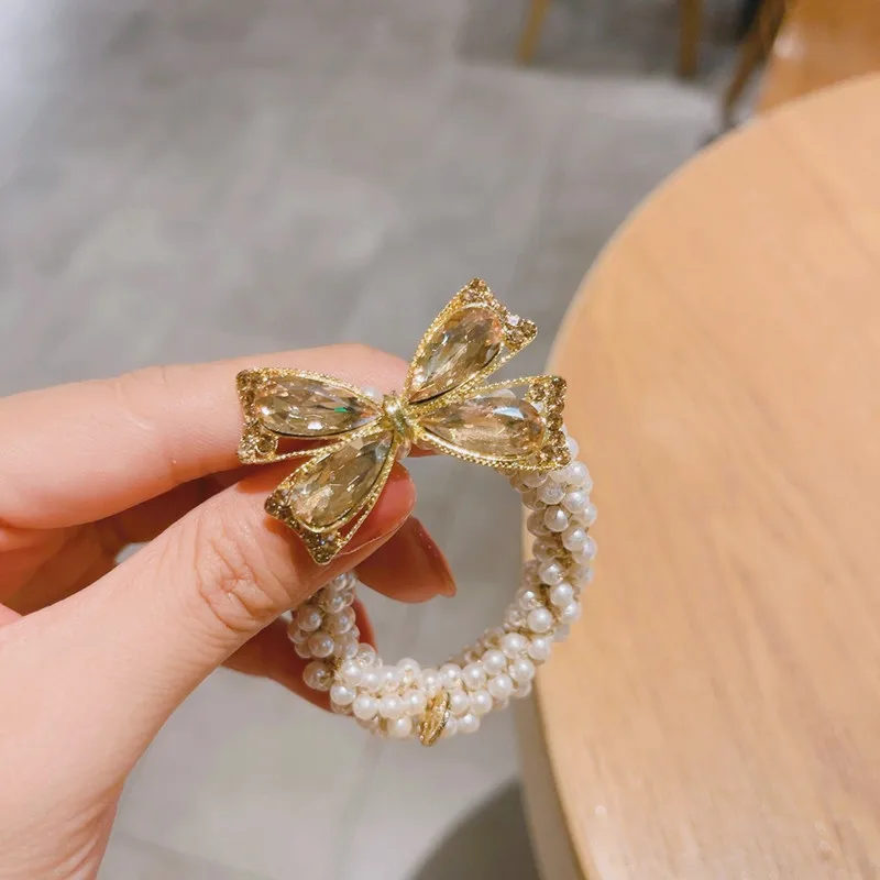 

Woman Elegant Pearl Hair Ties Rhinestone Bowknot Hair Rope Girls Rubber Bands Ponytail Elastic Hair Scrunchies Hair Accessories