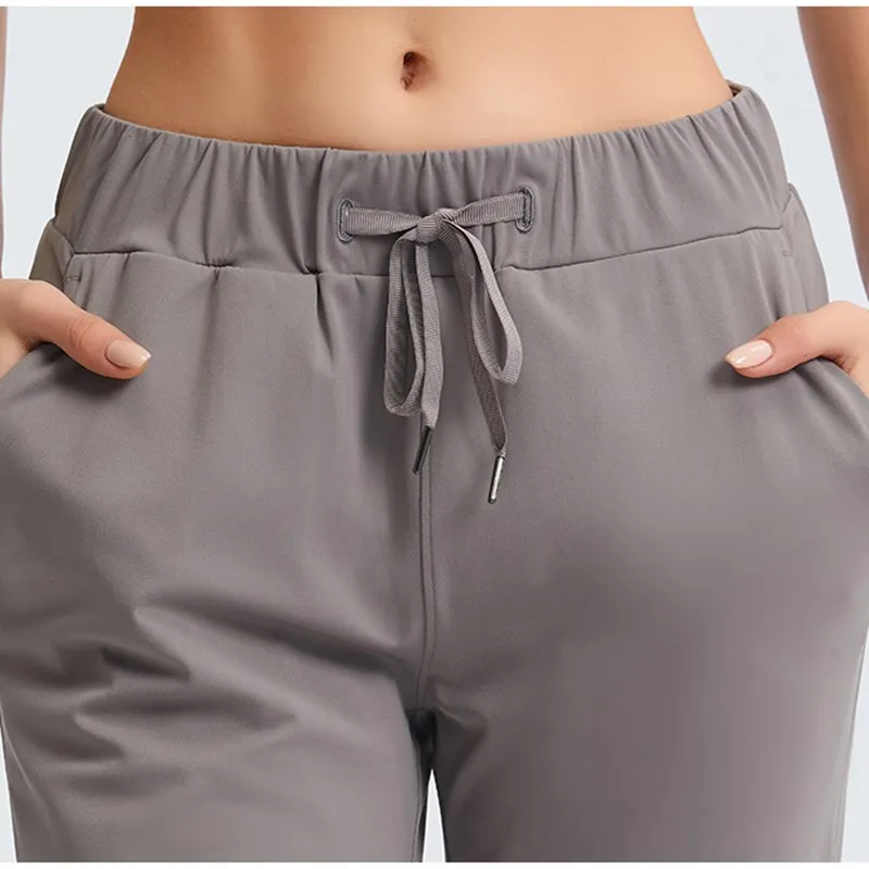 Sexy Leggings Workout Yoga Pants Fintess Running Gym Clothes Women's Loose and straight drawstring waist Exercise Sports Pants