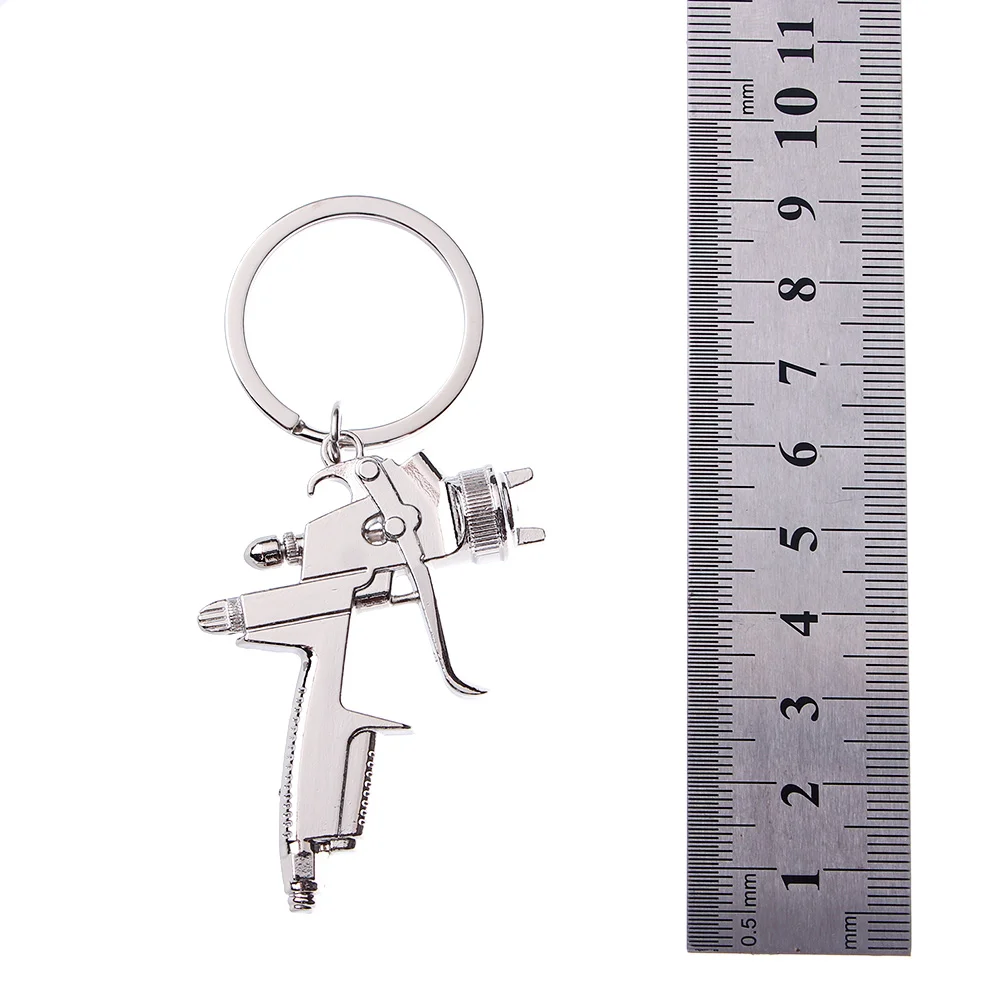 

1PCS New Water Spray Gun Keychain Handbags Men Creative Car Bag Key Ring Accessories Pendant useful Key chains