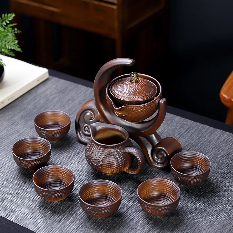 

Ceramic and stone grinding semi-automatic tea set, creative kungfu tea set is popular.