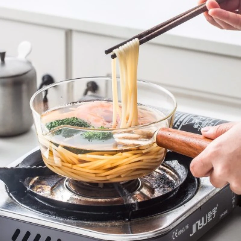 

Glass milk jug with wooden handle 400ml / 600ml is used for cooking pasta salad gaskettles and pans