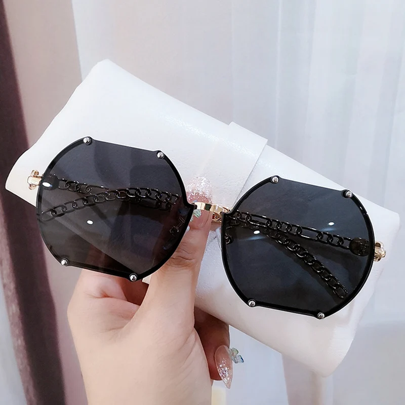 

Women Sunglasses Trending American Style Frameless Trimming Glasses Personality Fashion Metal Chain Temple Luxury Men's Glasses