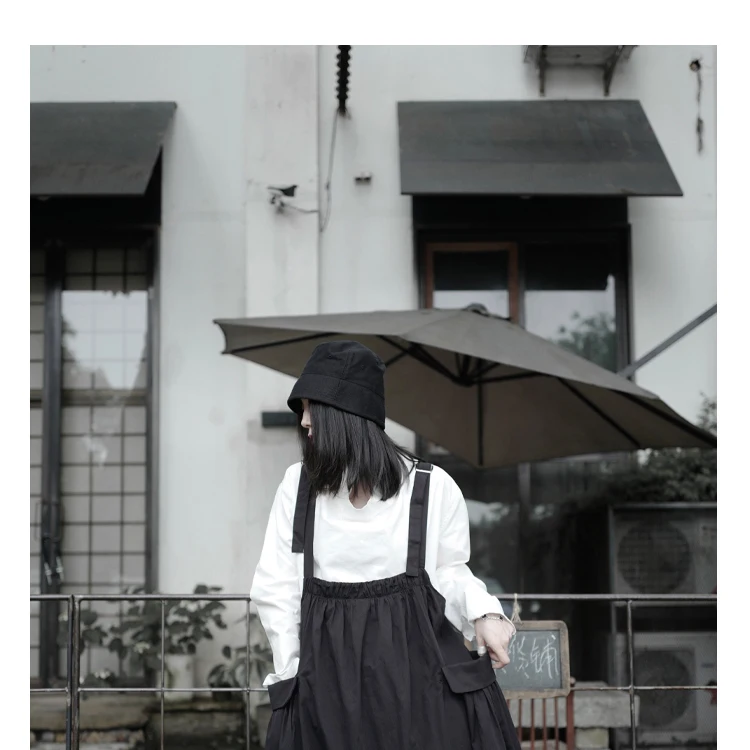 

All-match large swing skirt female sling Japanese big pocket design black pleated stitching sling skirt women's mini skirt