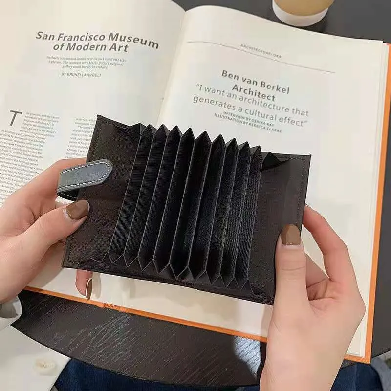 

Luxury brand women's zero wallet women's small, ultra-thin, high-end and exquisite anti and stealing brush credit card cover