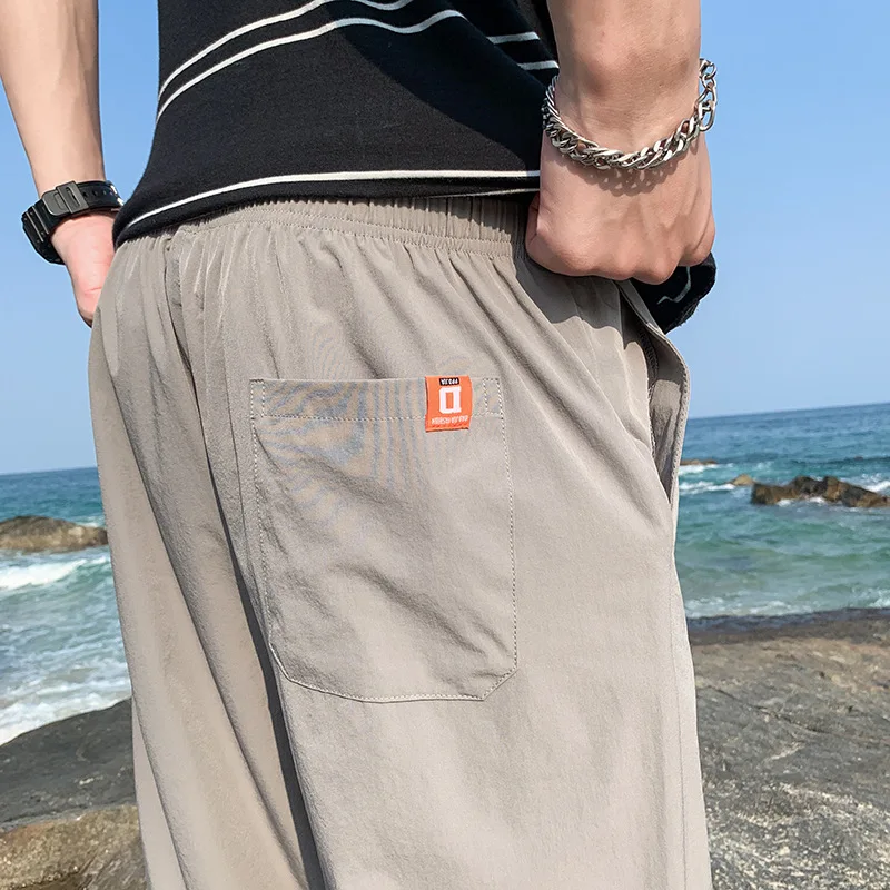 

Men 2021 Summer New Korean Fashion Loose Legged Sports Leisure Ice Silk Middle Pants Student Boy Youth Pants Quick Drying Shorts