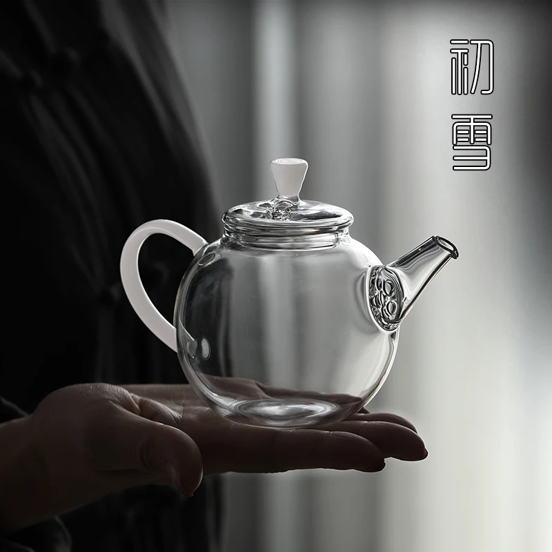 

Один человек, который пьет маленький чайник с нагревательным стеклом-это одна кастрюля для рота, миниатюрный чайник, офисный фильтр, чайный ...