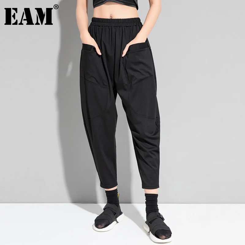 

[EAM] Black Pockets Spliced Elastic Waist Trousers New Loose Fit Harem Calf-Length Pants Women Fashion Tide Spring Summer 2022