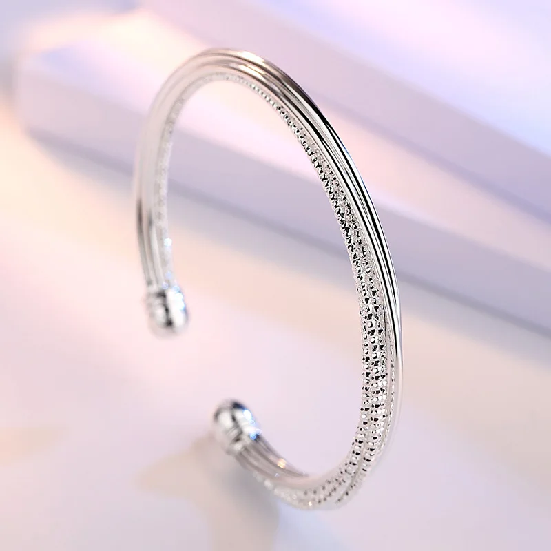 

MEYRROYU Silver Color Hot Selling Wedding Bangle Exquisite Shiny Wave Pattern Round Open Jewelry Female Anti-allergy Andywen