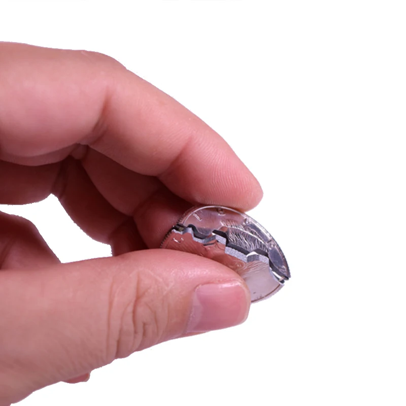 Два складных искусственных элемента и восстановленная монета искусственная для