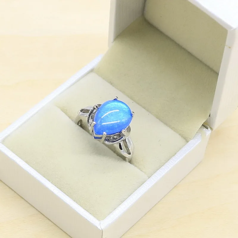 Женский ювелирный комплект из колье и серёг с голубым опалом | Украшения