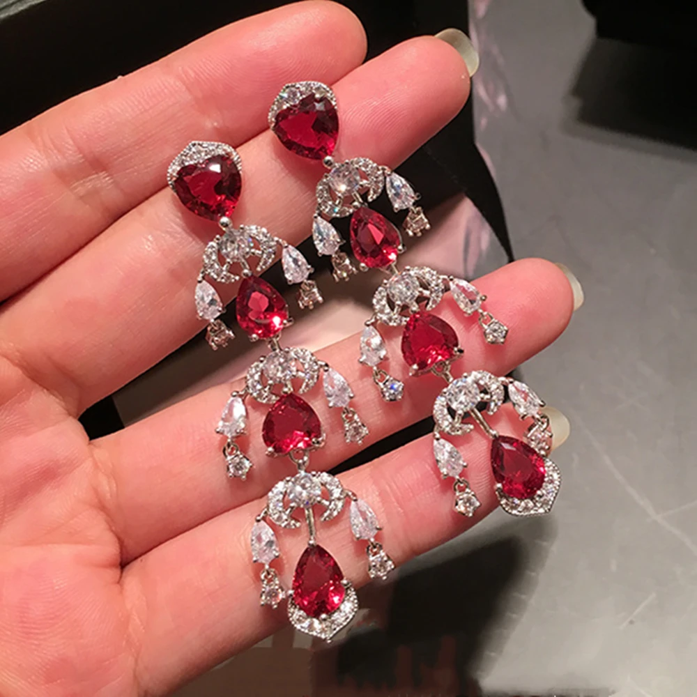 Массивные серьги с красными кристаллами висячие кисточками хорошее ювелирное