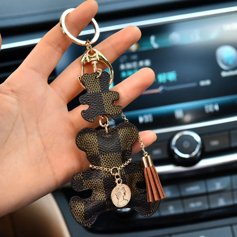 

Luxury Ladies Keychain High Quality Leather Bear Tassel Hair Ball Pendant Trendy Fashion Bear Car Key chain Charm Jewelry Holder