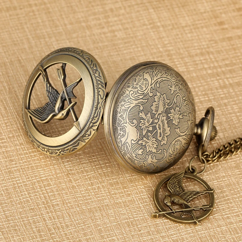 

The Hunger Games Mockingjay Bronze Alloy Hollow Quartz Pocket Watch Anime and Movie Theme Retro Pocket Watch