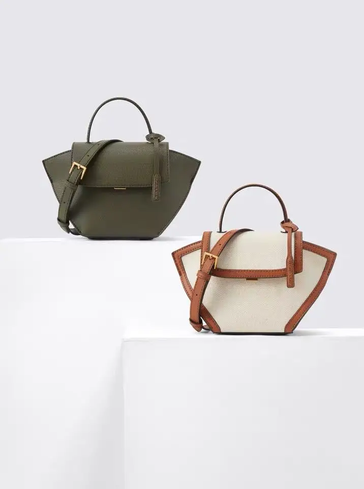 

Hand held flap wing bag medium single shoulder straddle women's bag