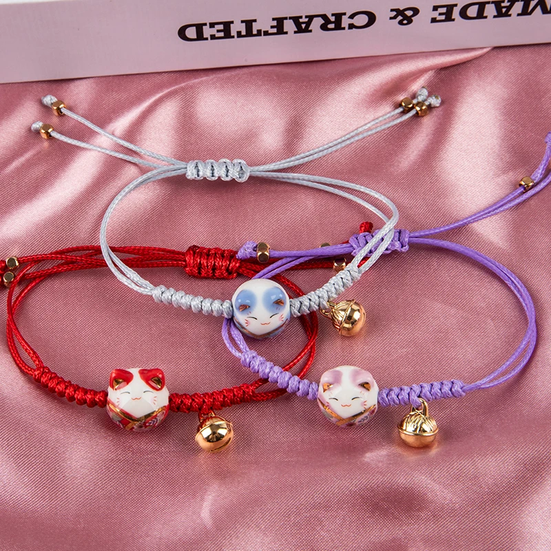 

2021 New Ceramic Lucky Cat Bell Bracelet Female Hand-woven Rope Bangle Couple Bangle Gift