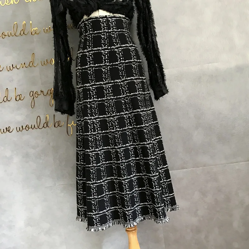 

Lattice fringes thick knit female qiu tall waist elastic soft black skirts posed MIDI work