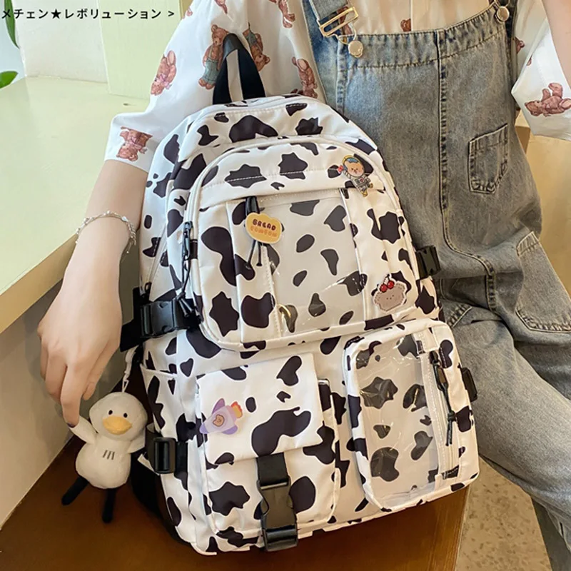 

Женский рюкзак с принтом зебры DIEHE, школьные ранцы для студентов, большая дорожная сумка из коровьей кожи, рюкзак для девочек-подростков, сум...