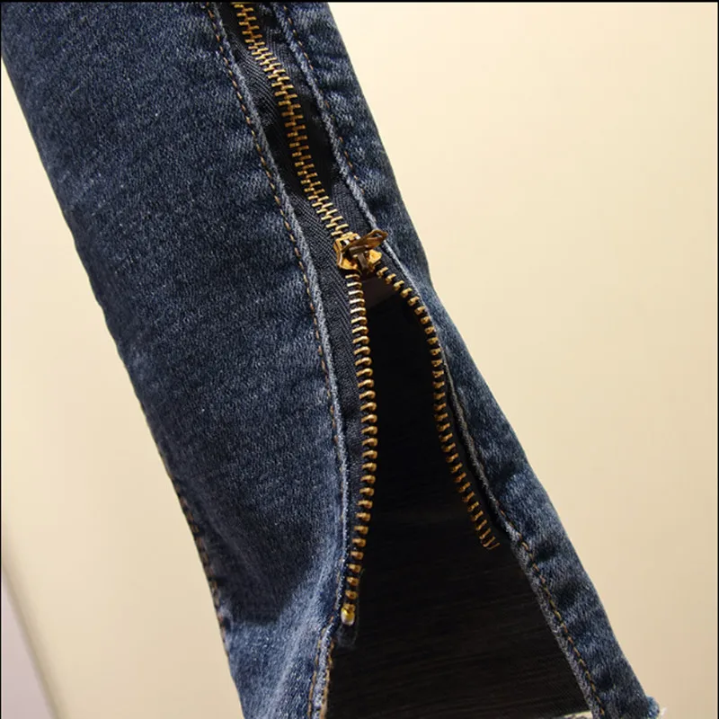 Джинсы с высокой талией обтягивающие большие размеры на молнии отворотом по