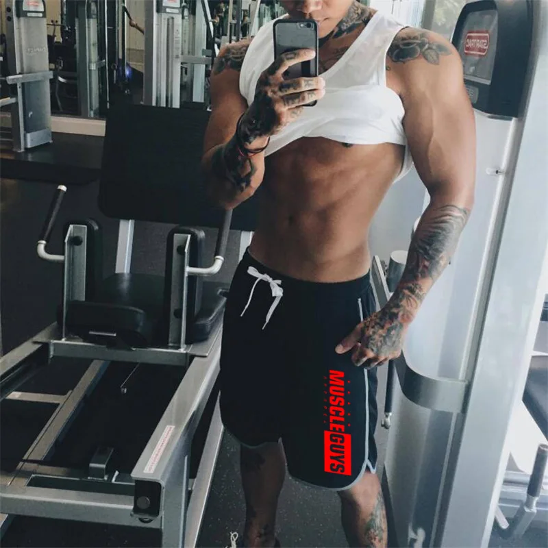 Muscleguys шорты для спортзала мужские с сеткой Короткие брюки повседневные шорты для бега спортивные брюки для фитнеса мужские спортивные шорты