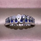 Кольцо женское из серебра скрученный круг пробы, с голубым цирконием