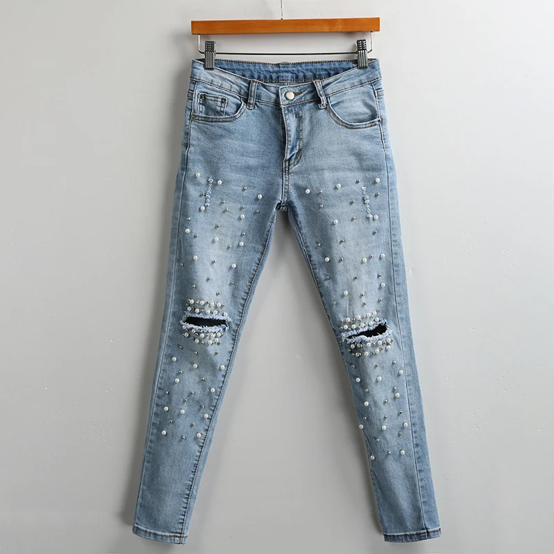 Женские джинсовые брюки с перламутровыми вставками повседневные рваные