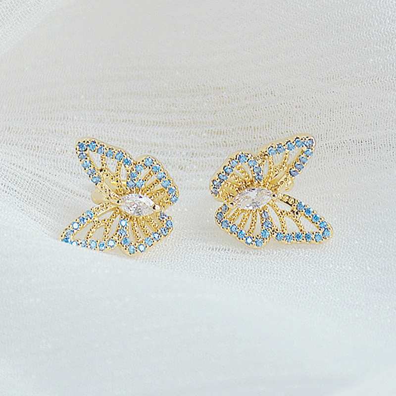 

Trendy Blue Micro Inlaid Rhinestone Butterfly Women Earring for Women AAA Zircon Ear Bone Clip Stud Earrings Wedding Party Jewel