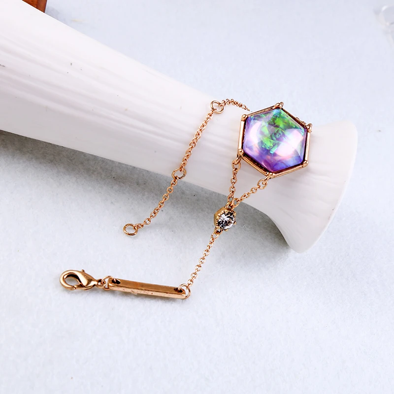 Женский браслет в богемном стиле с кристаллами и геометрическим орнаментом