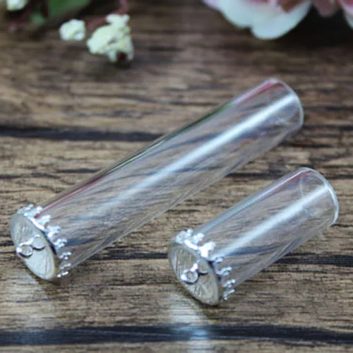 Стеклянная трубчатая бутылка с короной и металлической крышкой стеклянные