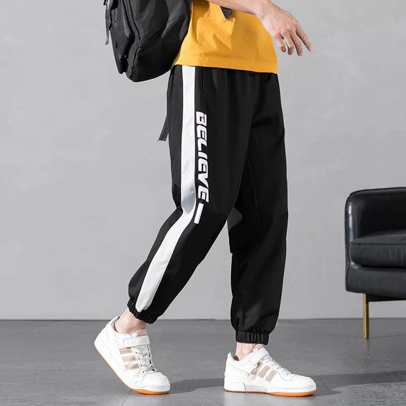 

Spring New Men Joggers Pants Male Loose Casual Striped Harem Trousers Mens Sportswear Sweatpants Letter Print Hip Hop Streetwear
