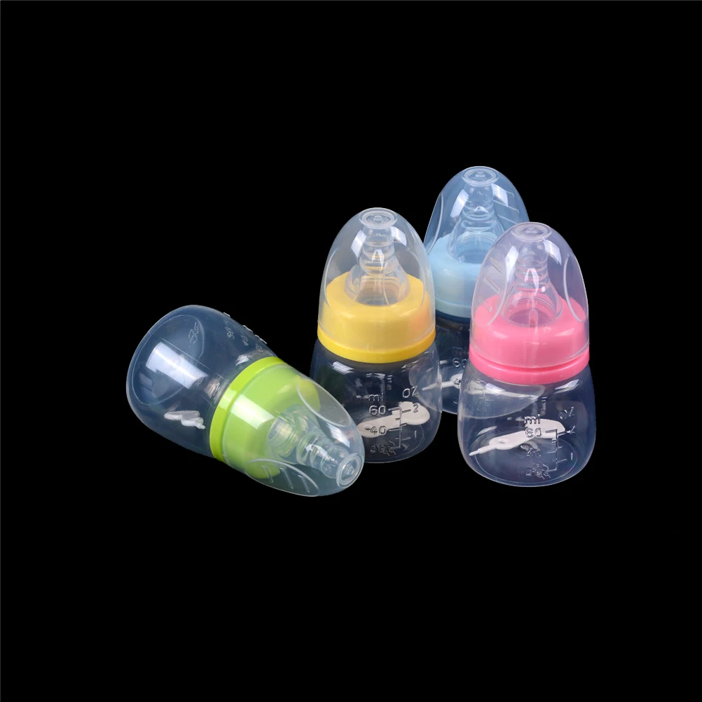 

60ML Random Color Newborn Baby Nursing Milk Fruit Juice Water Feeding Standard Mouth Silicone Nipple Pacifier Drink Bottle