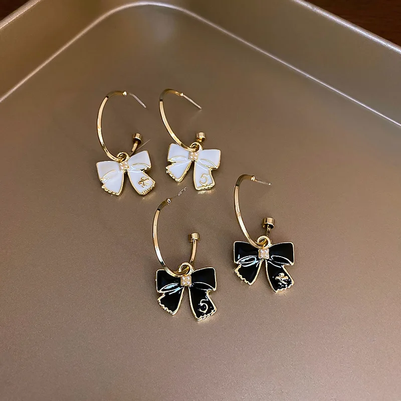 

New Sweet Black White Enamel Bowknot Drop Pendientes For Women Fashion Jeewlry Bow Tie Brincos Feminino
