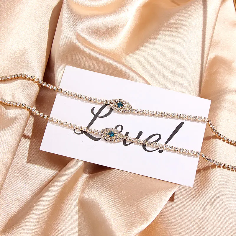 Браслеты на ногу женские золотистые анклет с кристаллами и звеньями сглаза